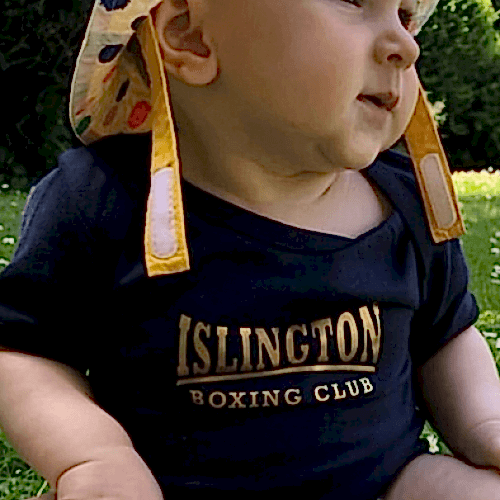 Coach Rider's Baby in a custom IBC baby grow